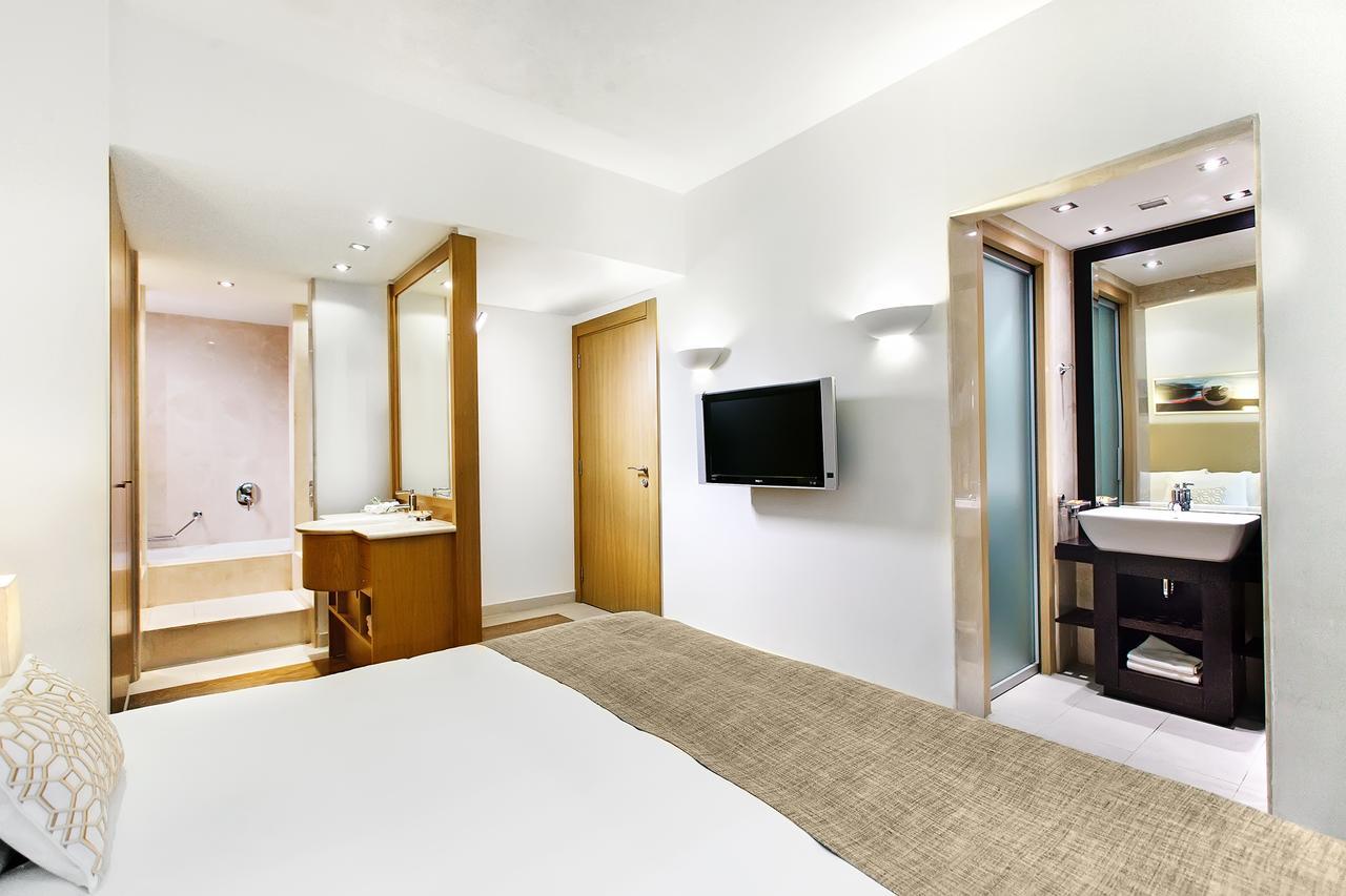Daios Luxury Living Hotel Thessaloníki Luaran gambar A typical room at the hotel
